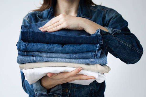 istock Woman Holding Jeans 1440328990