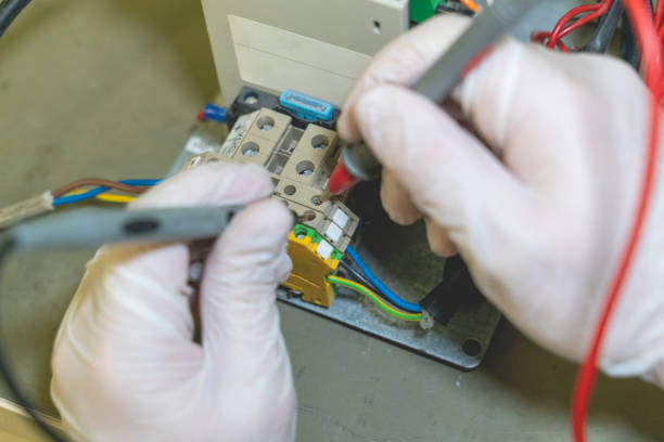 istock Repairman Checking Voltage With Digital Multimeter stock photo 1440331905