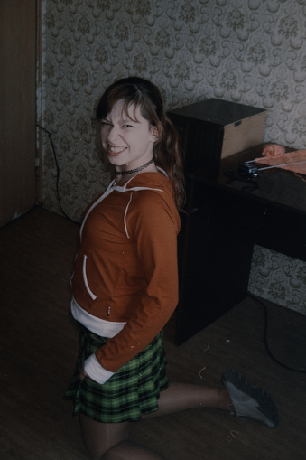 Vintage home photo of posing teenage girl