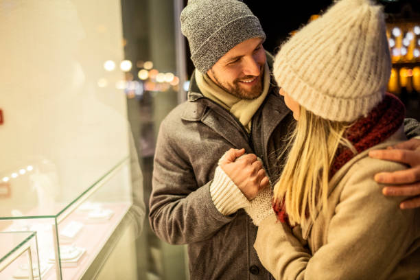 istock Romantic young couple Outdoors on Christmas 1440332902