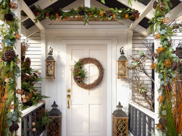 Christmas wreath hanging on a wooden door.