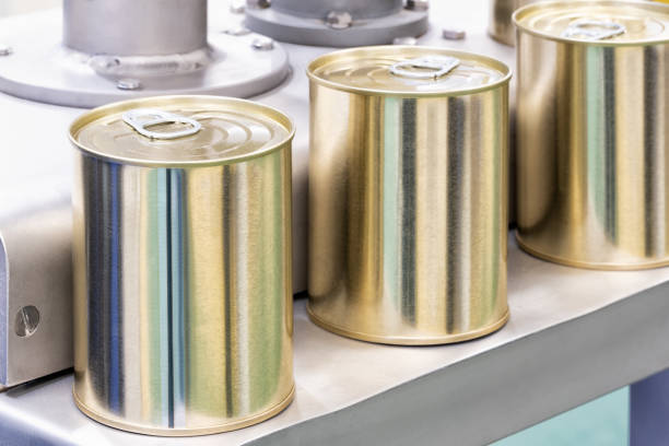 istock Industrial machine used in canning jar production. A close-up view. 1440342204