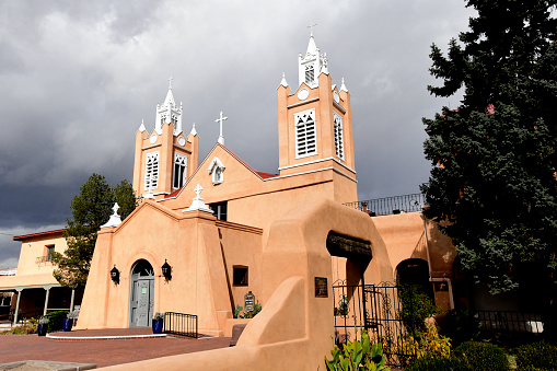Albuquerque NM, CO. USA -November 3, 2022 The San Felipe de Neri Catholic Church  is in Albuquerque New Mexico. The Church sits on the Old Town Plaza and was built in 1793. It is one of the oldest Historic buildings in the city.