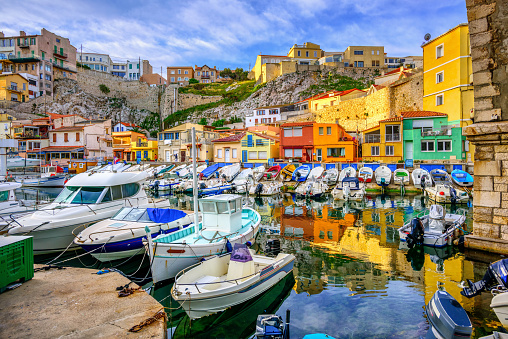 Colorful traditional houses and boats in Vallon des Auffes, the old fishing port in Marseille, Provence, France