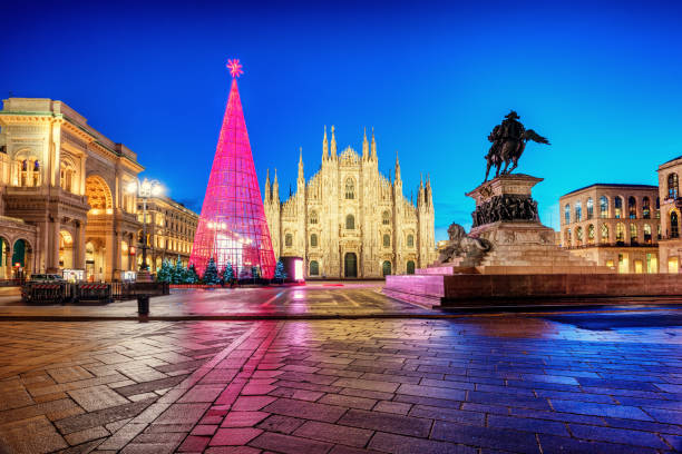 Milan Duomo cathedral square illuminated at Christmas time, Italy