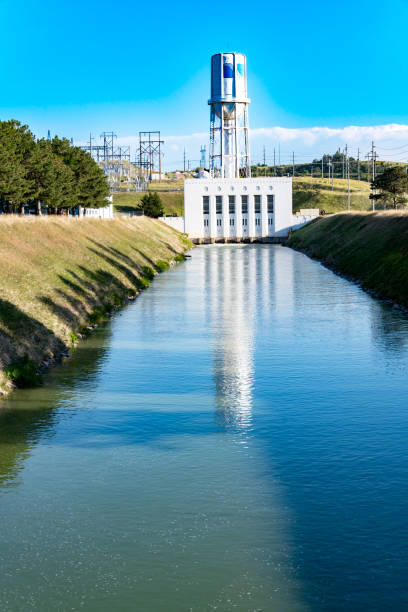Power plant - North Platte The discharge canal at the North Platte Hydroelectric Plant.  Water is diverted from the South Platte River and reservoir system to power turbines that generate electricity.
North Platte, Nebraska, USA
07/13/2022 robert michaud stock pictures, royalty-free photos & images