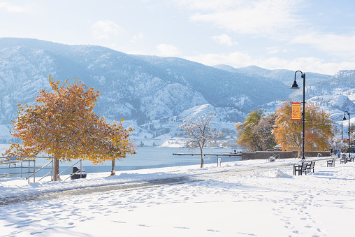 Scenic winter view of Skaha Lake and mountains after a snowstorm