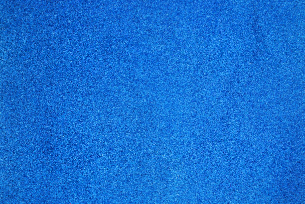 istock blue glitter, shiny background, sheet of paper for creativity 1440349935