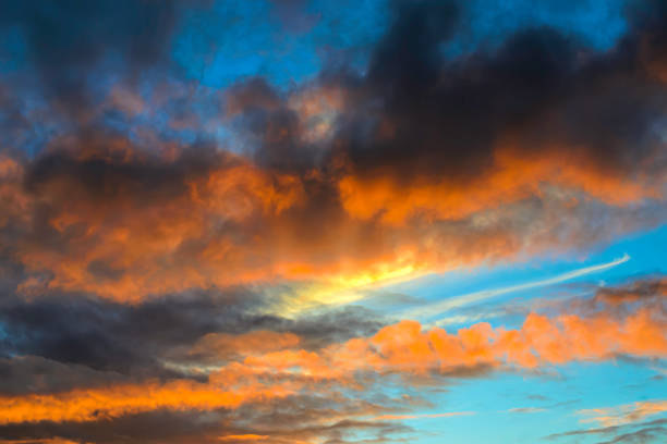 istock Sunset, landscape with dramatic sky and colorful clouds 1440351887