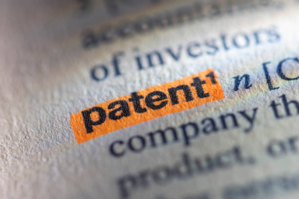 Patent Patent written in a dictionary PATENT  stock pictures, royalty-free photos & images