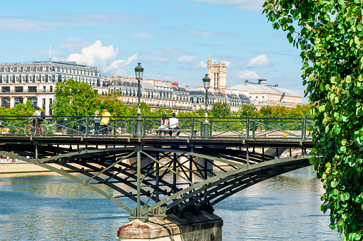 Ponts des Arts, a beautiful footbridge across the Seine river, in Paris