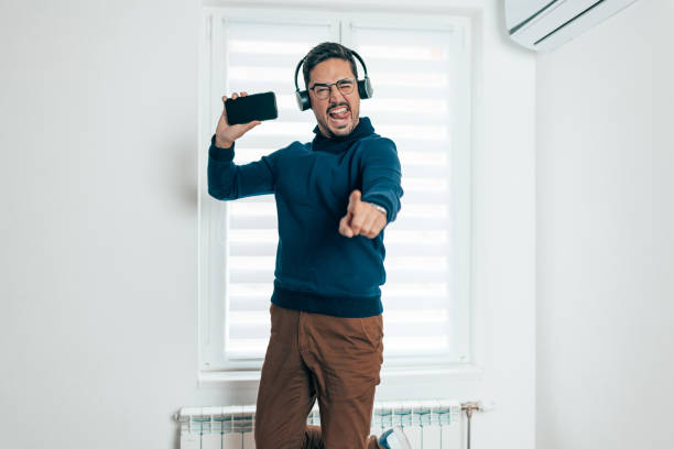 istock Happy businessman pointing at you 1440360211