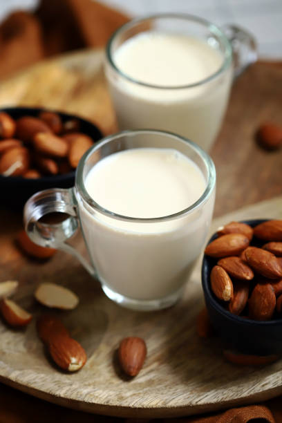 istock Almonds and almond milk in a glass. 1440371109