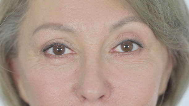 istock Eyes of Old Woman Looking at Camera 1440373670
