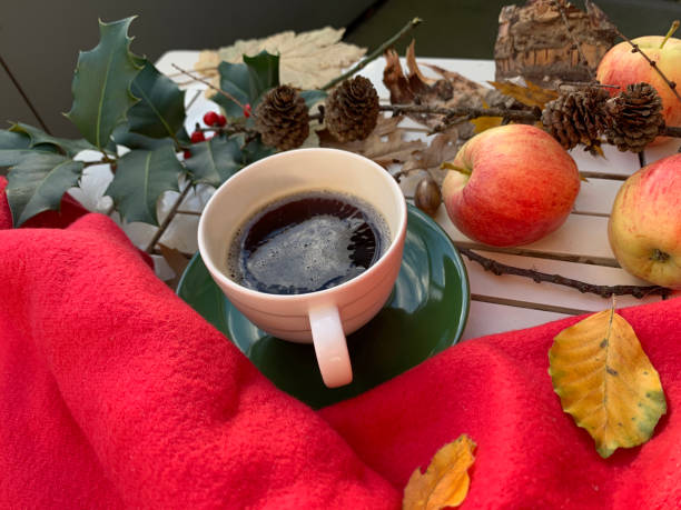 istock Still life with coffee, autumn leaves and apples 1440373897