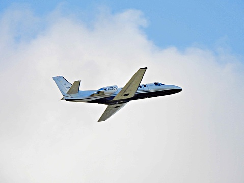 Boca Raton, Palm Beach County, Florida, USA, October 24, 2022. A Cessna fixed wing multi engine 8 seats / 2 engines 
N550LS taking off from the Boca Raton Airport.