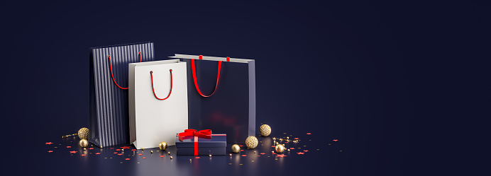 3d rendering of shopping bags for christmas or winter sale with decoration and xmas balls in front of dark background and copy-space symbolizing shopping for web advertising