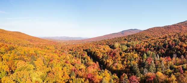 Aerial panorama of the valley with Smugglers Notch vacation and skiing resort in the fall