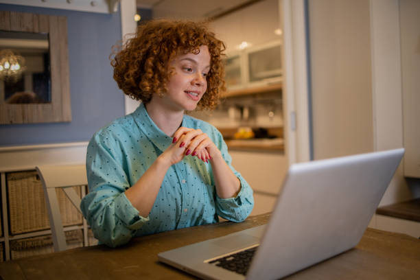 istock Young woman working from home 1440384548