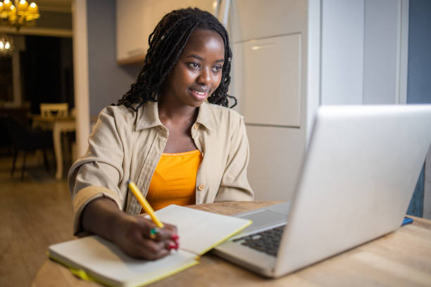 istock Young woman working from home 1440385245