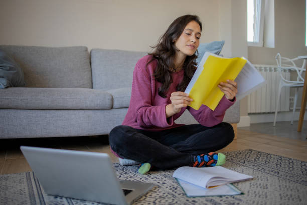 istock Young woman working from home 1440386347