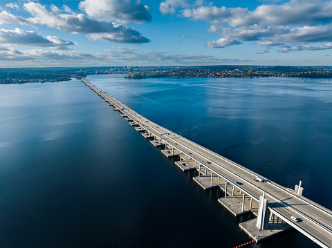 Vehicles travel across the I-520 floating bridge in Medina during the afternoon commute to Seattle.