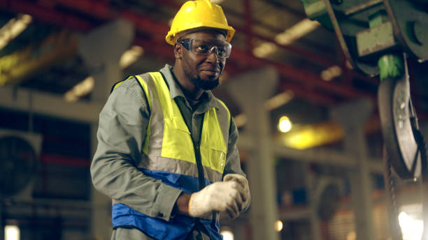 istock Factory workers are moving goods in the factory. 1440398845