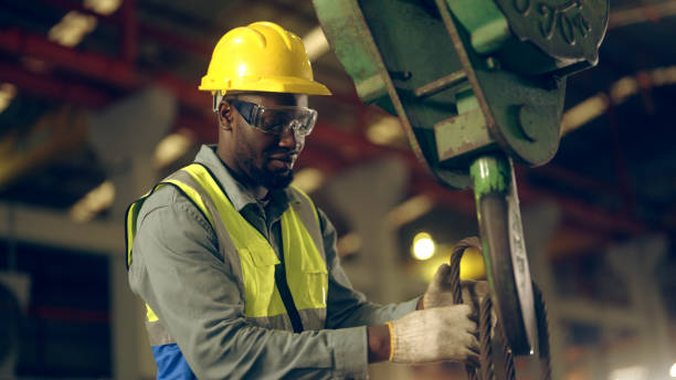 istock Factory workers are moving goods in the factory. 1440398848