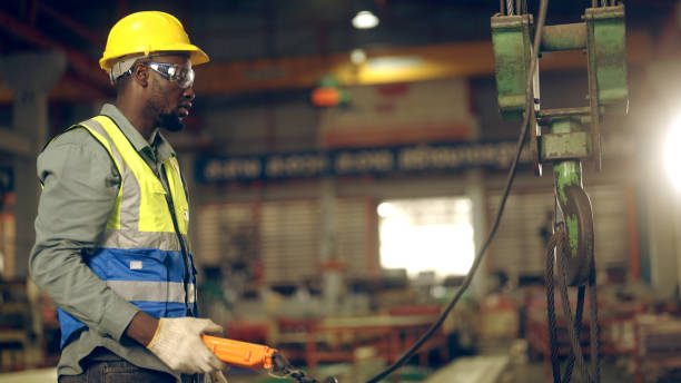 istock Factory workers are moving goods in the factory. 1440398849