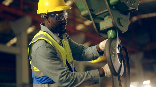 istock Factory workers are moving goods in the factory. 1440398865