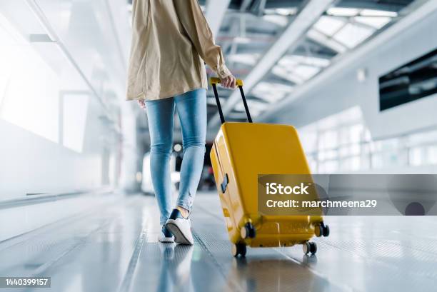 International Airport Terminal Asian Beautiful Woman With Luggage And Walking In Airport Stock Photo - Download Image Now