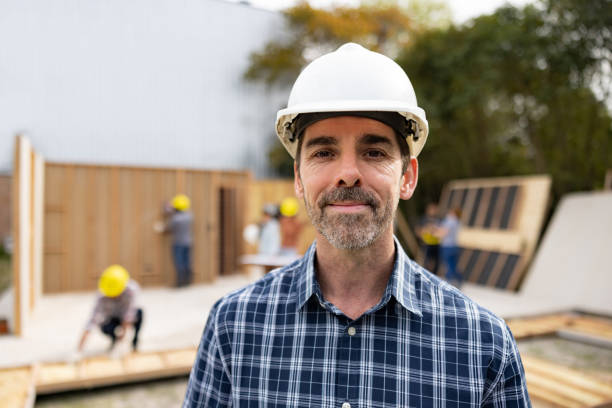 istock Portrait of an architect working at a construction site 1440404355