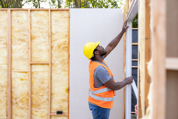 istock Contractor installing a sliding door while building a house 1440404581