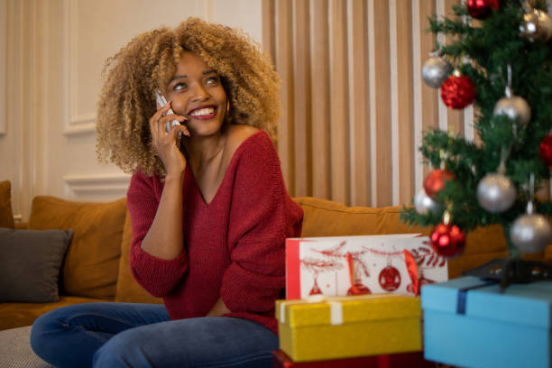 istock Happy woman celebrating Christmas 1440409533