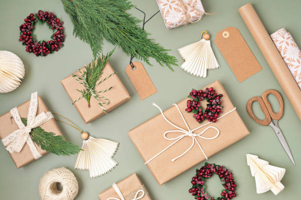 istock Christmas background with gift boxes and kraft wrapping paper 1440410424