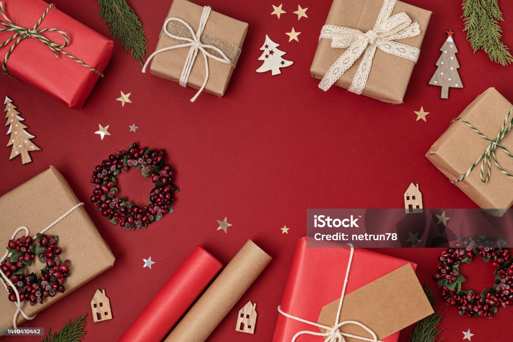 Christmas Background With Gift Boxes And Rolls Of Kraft Wrapping Paper  Stock Photo - Download Image Now - iStock
