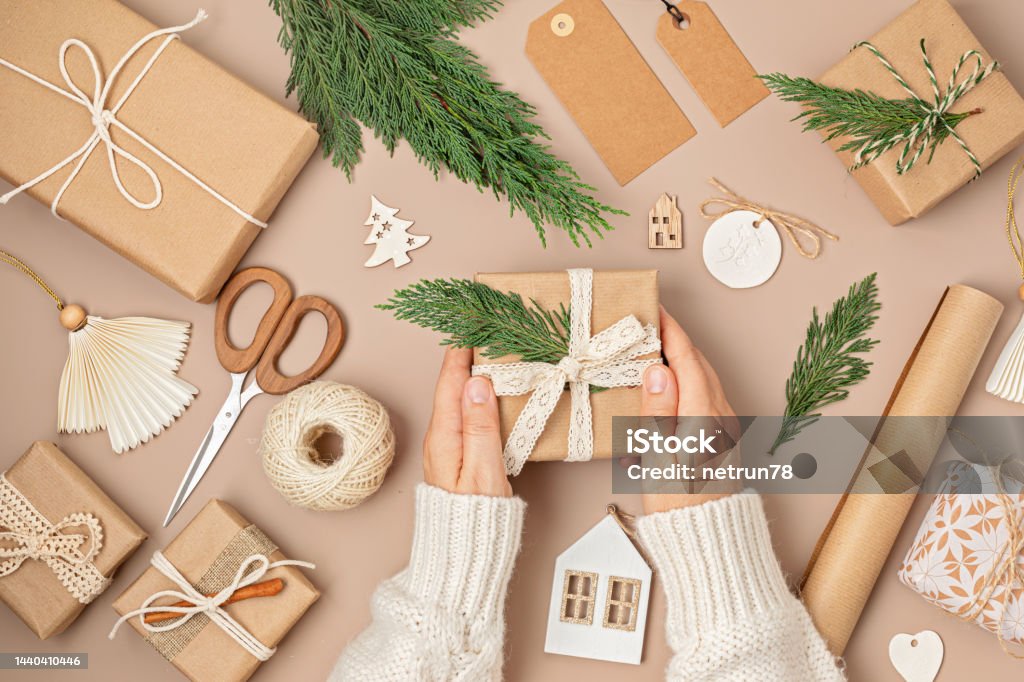Christmas Background With Gift Boxes And Rolls Of Kraft Wrapping Paper  Stock Photo - Download Image Now - iStock