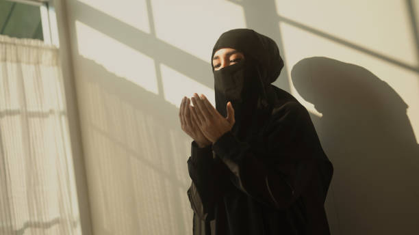 istock islamic prayer woman 1440410763