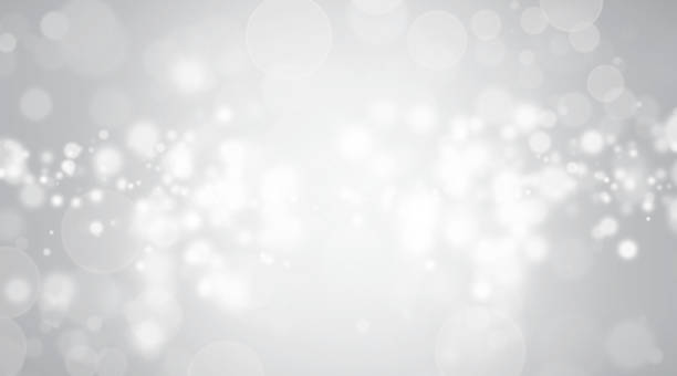 istock Abstract Beautiful White Bokeh Glitter Lights Gray Background. Defocused Effect Wallpaper, Celebration Christmas Backdrop. 1440414332