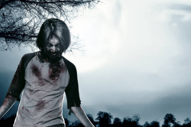 istock Scary zombie with blood and wound on his body 1440415254