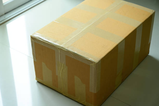istock brown box packaging for shipping, paper textured 1440421582