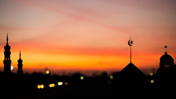 istock Mosques Dome on Dusk Sunset Twilight Sky and Bokeh Light Background 1440422604