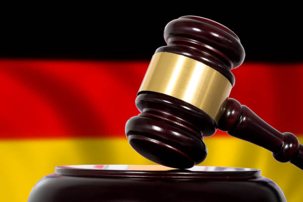 Flag of Germany, court and a judge's hammer stock photo