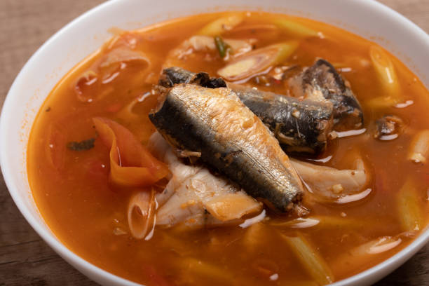 istock Tom Yum canned fish in a cup. Spicy soup. 1440434228