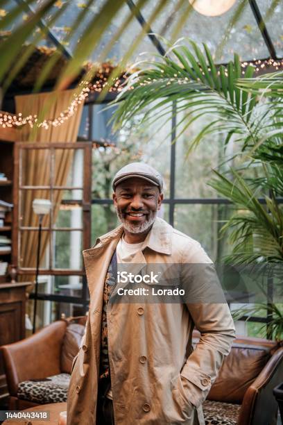Lifestyle Portrait Of Handsome Black Man Stock Photo - Download Image Now - Bar - Drink Establishment, One Person, Handsome People