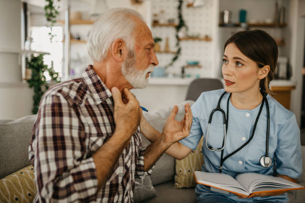 istock Nurse writing down medical complains 1440444017