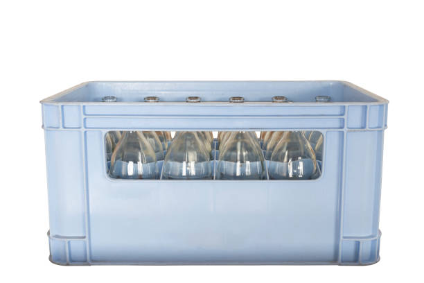 istock Bottle of water in a crate isolated on white background with clipping path 1440446432