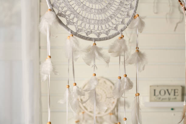 istock Beautiful dream catcher on the wall with lights. Boho handmade. Style 1440447065