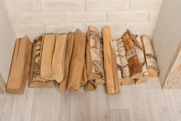 firewood in the decorative fireplace. interior decoration