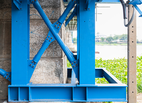 Steel frame scaffolding at the bridge renovation work on the river